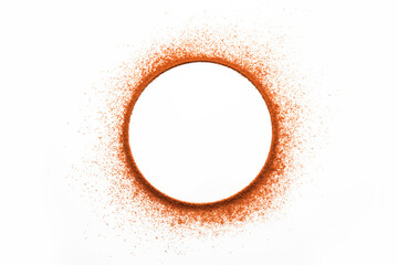 Red Chilli or Lal Mirch powder on the white background forming outer ring shape
