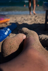 feet on the beach