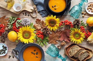 Table setting for Thanksgiving day brunch or dinner. Table decoration for festive autumn family...