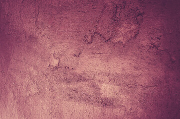 Rough magenta with a yellow glow plaster texture background. Front view. Vintage and antique art concept. Colorful texture. Detailed closeup shot. Toned