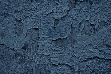 Blue background. Abstract wallpaper. Old stucco wall texture.