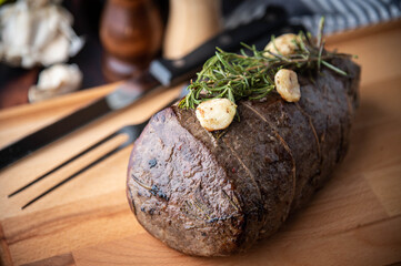 roasted eye of round chunk meat with rosemary and garlic