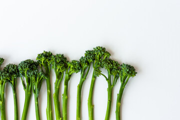 Fresh broccolini isolated on white background with copy space, vegetarian concept.