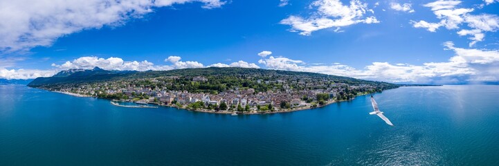 Fototapeta na wymiar Aerial panoramic view of Evian (Evian-Les-Bains) city in Haute-Savoie in France