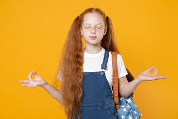 School teen girl 12-13 years old white t-shirt backpack isolated on yellow background children studio portrait Education lifestyle concept hold hands in yoga gesture relax meditating try to calm down