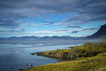 Glacier reflected on the water. View from Stokksnes. East Iceland landscape