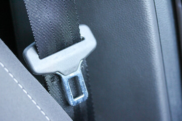 Close up of a seat belt buckle