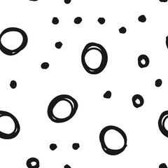 Doodle circles seamless pattern. Black dots texture background.