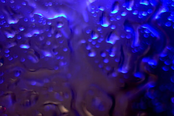 Abstract water droplets on a blue background
