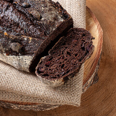 .Italian cocoa bread - Natural fermentation. Wood background. Selective focus