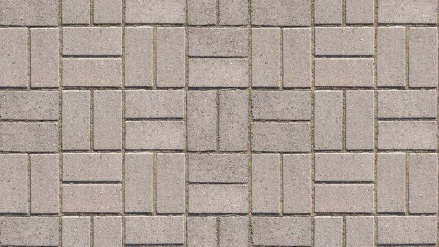 Seamless looping motion. Specially prepared for filling the background with a seamless brickwork pattern. Antique brickwork of baked clay brick. Vertically oriented video.
