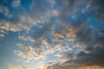 Naklejka na ściany i meble Majestic clouds burning by sunrise. Sky background