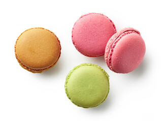 various colorful macaroons on white background