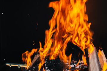 burning firewood in a barbecue or barbecue.