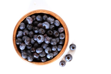 Blueberries in a wooden bowl