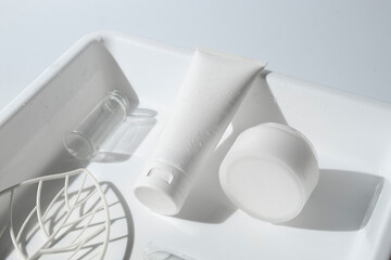 beauty treatment medical skincare and cosmetic lotion cream serum oil mockup bottle packaging product on water splash background in healthcare and medicine