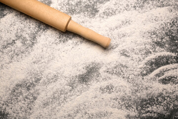 Scattered flour and rolling pin. Ideas as background