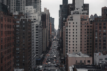 New York City, USA - February 14 2020: the streets of New York are clogged with cars and tall skyscrapers
