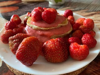 strawberry tart on white plate