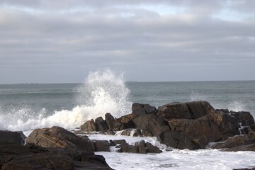 waves crashing on rocks