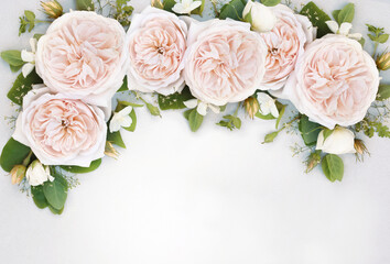 Delicate blossoming rose flowers frame, blooming pastel festive background, soft pink bouquet floral card, toned