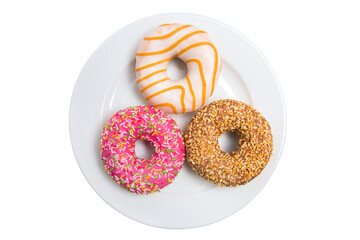 Sweet donuts, cakes on a white plate isolated on a white background