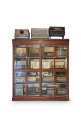 Retro radio on cabinet isolated on white background