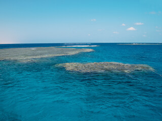 Top view on sea surface with coral reefs (Red sea, Egypt)