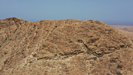 Fototapeta na wymiar desert that joins the sea for its mountains and ravines