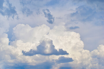 Blue and white storm Cumulus clouds before bad weather