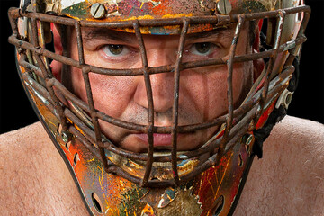 Defender. Portrait of a brutal man in a protective mask Mask