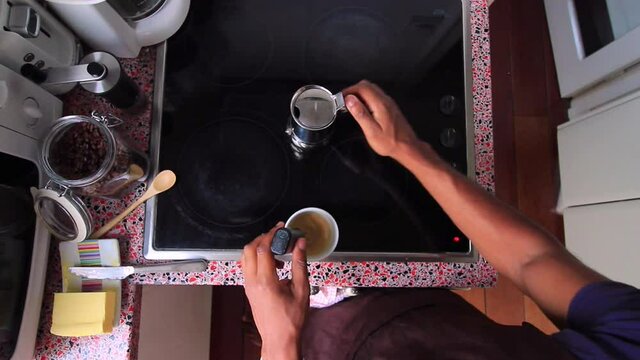 Top view person preparing bulletproof coffee with pods