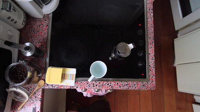 Top view person preparing bulletproof coffee with pods