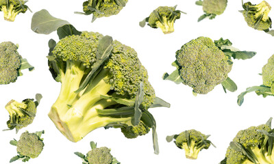 Levitation of broccoli on a white plate with selective focus. Banner, wallpaper, advertising.