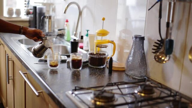 Top view person preparing bulletproof coffee with pods