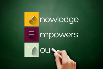 KEY - Knowledge Empowers You acronym, business concept on blackboard