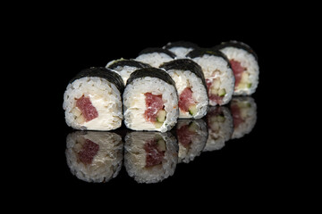 Sushi on a black hundred percent black background