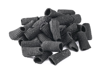 Squid ink raw Rigatoni pasta isolated on a white background, macro
