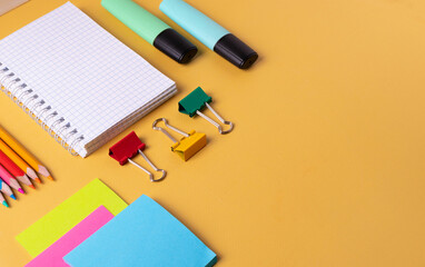 student's or office desk with stationary