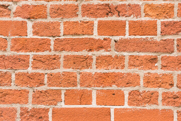brick red wall texture. background of a old brick house.