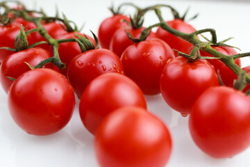 tomatoes cherry on a white background