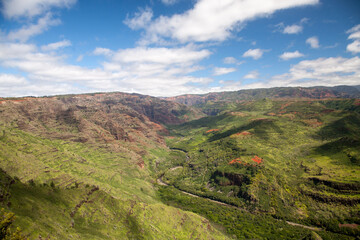 Waimea Canyon, on the Hawaiian island of Kauai, also known as the Grand Canyon of the Pacific, is a large canyon, approximately ten miles long and up to 3,000 feet deep.