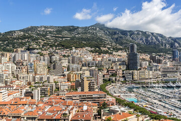 Naklejka premium Panoramic view on excellent residential buildings and marina in Monte Carlo, Monaco. Principality of Monaco is a sovereign city state, located on the French Riviera in Western Europe.