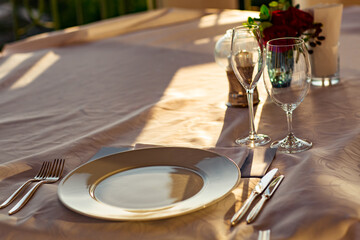 beautiful table setting, with dishes, food, in a summer cafe