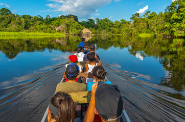 Transport in canoe along the rivers of the Amazon River Basin inside Yasuni National Park with a...