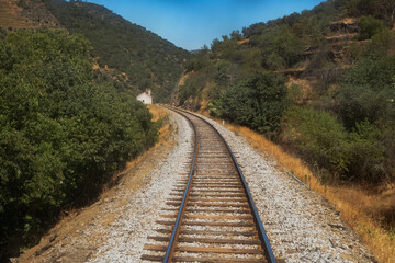 Train Railroad in The Valley of the River Douro, Portugal - Port Wine Vineyards Region with...