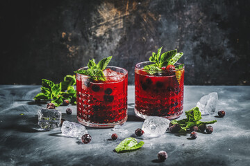 Freshmade cocktail with blackberry and mint