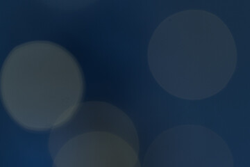 Defocused Natural Lights Bokeh. Abstract Pattern Blue Sea Navy Background