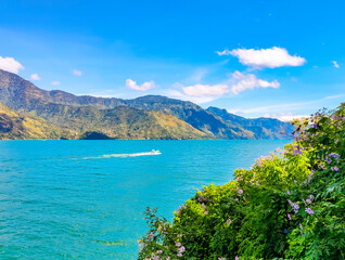 Blue Lake Atitlan surrounded by Volcanoes in Guatemala