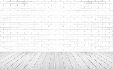 Empty room with grey wooden floor with brick wall background. Studio or office blank space.
